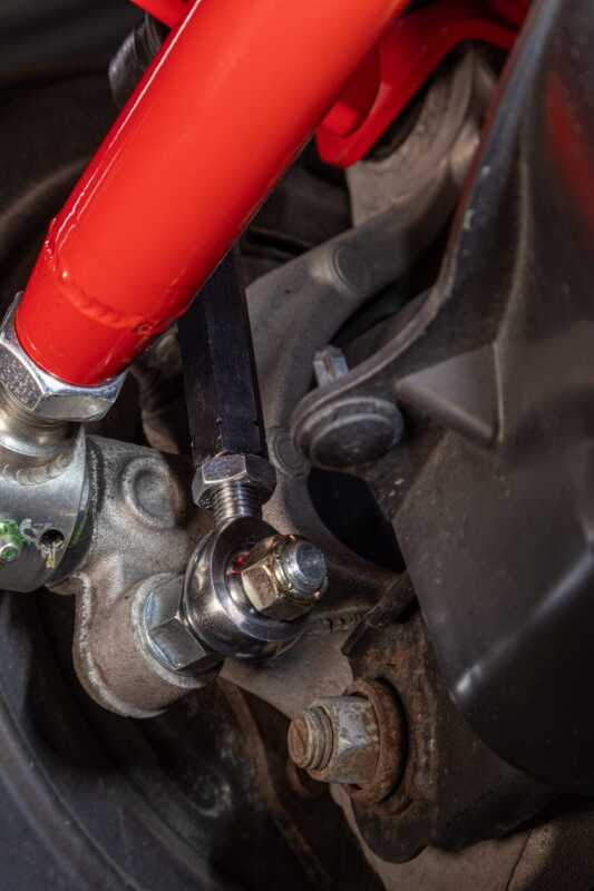 UMI Performance 16-24 Chevrolet Camaro Suspension Stabilizer Bar Link - Red - 2549