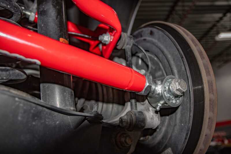 UMI Performance 16-24 Chevrolet Camaro Alignment Toe Arm - Red - 2544-R